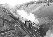 GWR 4-6-0 No 5076 'Gladiator' is seen approaching Harbury Tunnel on an up express