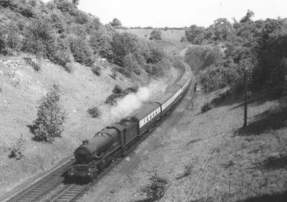 GWR 4-6-0 No 6024 'King Edward I' at the head of a Paddington to Birmingham express leaving Harbury Tunnel
