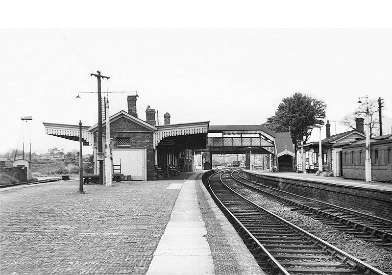 View along the down platform looking towards Birmingham with the main station building on the up platform on the right