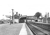 View along the down platform looking towards Birmingham with the main station building on the up platform on the right