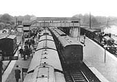 A view of a busy Hatton Station looking east towards Warwick from the road bridge