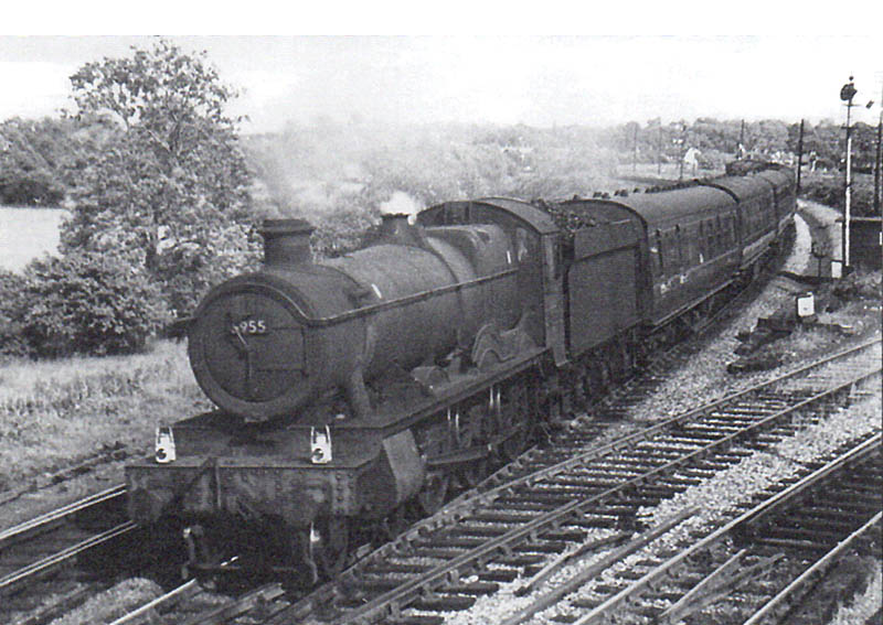 Ex-GWR 4-6-0 No 5955 'Garth Hall' passes over Hatton North Junction with a down express service circa 1960