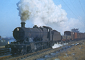Ex-GWR 2-8-0 28xx class No 2886 is seen passing Warwick Common as it begins its ascent of Hatton Bank on 21st December 1963