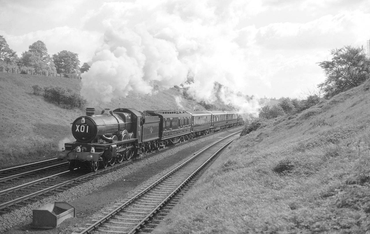 British Railways 4-6-0 4073 ‘Castle’ class No 4082 'Windsor Castle' is seen climbing Hatton Bank on the down main line with the Royal Train on 24th May 1962