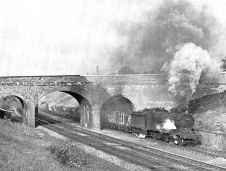Ex-Great Western Railway 2-8-0 30xx class ‘ROD’ No 3028 progressing slowly up Hatton bank on the down relief line with a heavy train