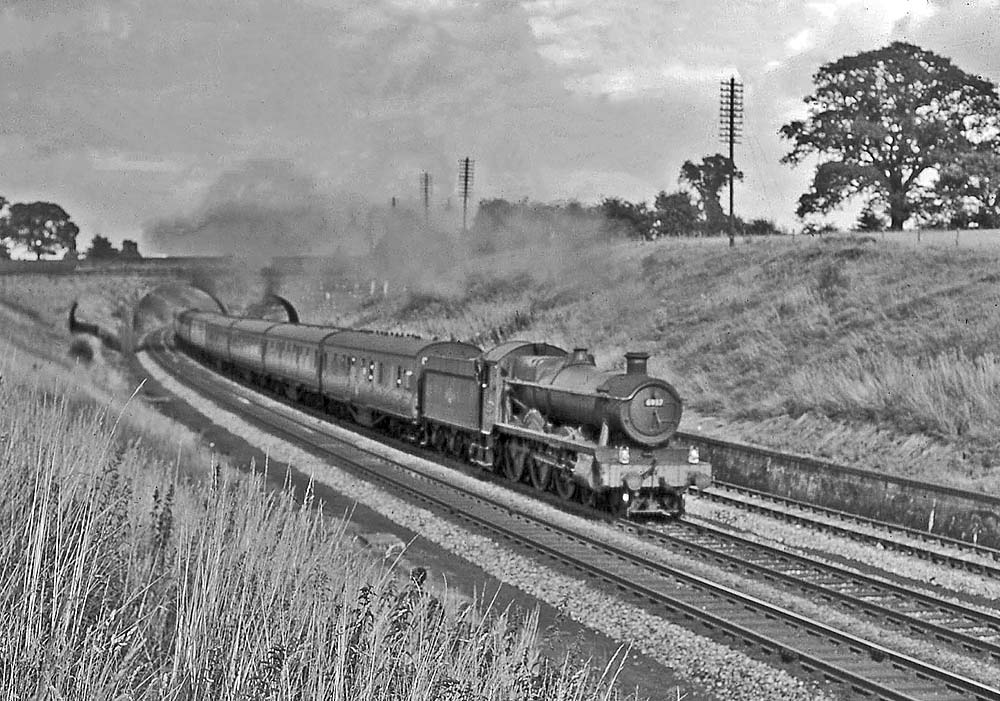 Ex-Great Western Railway 4-6-0 49xx Class No 6937 'Conygham Hall' climbs Hatton Bank with the 11:05 am Weymouth to Wolverhampton service on 18th August 1964