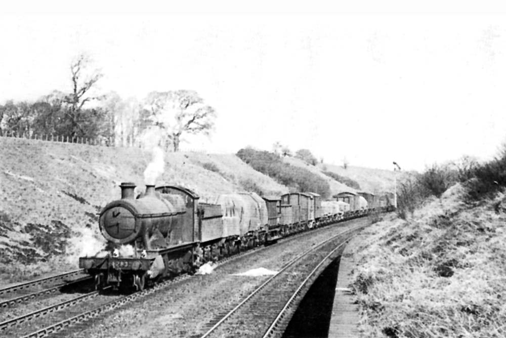 Great Western Railway 2-8-0 28xx class No 2832 ascends Hatton Bank with a class H through freight
