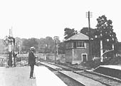 Close up showing the original junction with the spur to the branch line and the standard hip-roofed signal box controlling the station area