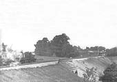 An unidentified GWR 4-4-0 Atbara class locomotive is seen approaching Henley-in-Arden on an up West of England express service