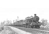 Ex-GWR 4-6-0 Grange class No 6844 'Penhydd Grange' is seen near Henley-in-Arden whilst at the head of a down freight in March 1950