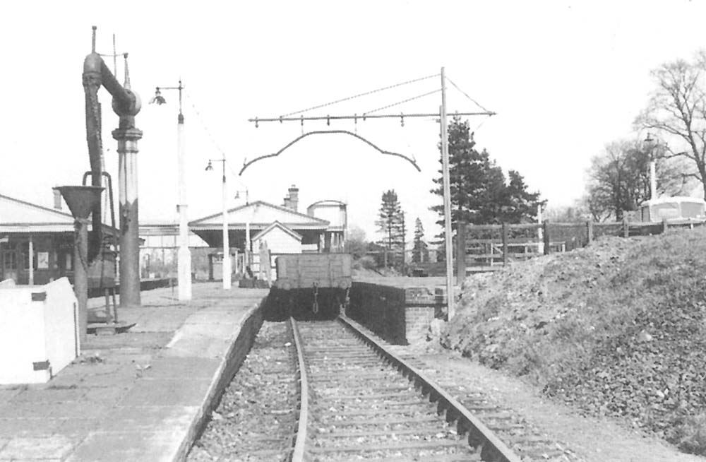 View of the down bay and water crane located at the Stratford upon Avon end of Henley-in-Arden's down platform in April 1950