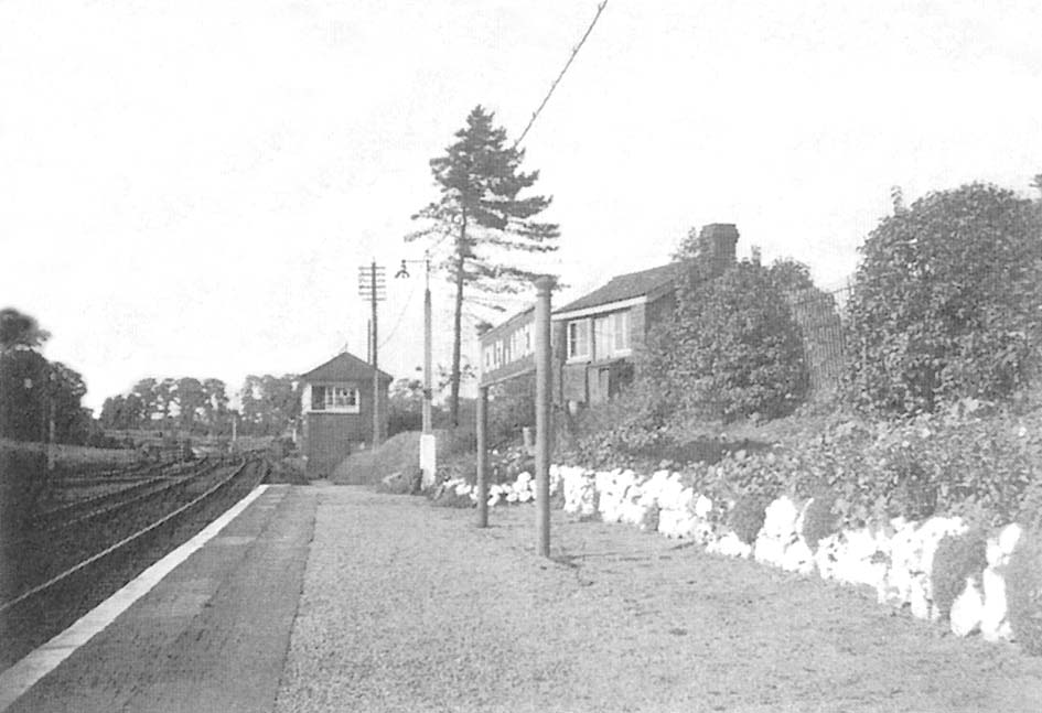 View of the Birmingham end of the down platform showing the porter's summer house on the right and the signal box in the distance