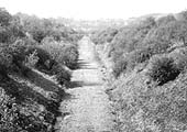 An elevated view of the abandoned branch line looking in the direction of Henley in Arden some forty plus years after the track had been lifted