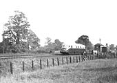 A GWR Diesel Railcar (thought to be Railcar No 2) crosses Bear Lane overbridge north of Henley-in-Arden Station