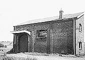 A side view of Henley-in-Arden's original goods shed now seen in a derelict state after the tracks in the yard were lifted in 1964