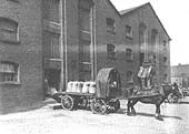 GWR single horse flat trolley being loaded with sacks for distribution at the end of the Inwards Shed and Warehouse