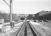 Looking along the down relief line with the steel girders carrying the railway over Icknield Street in the foreground