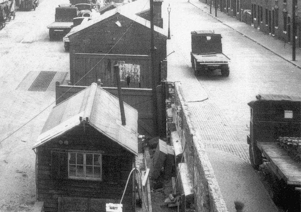 Close up showing the entrance to the yard and weighbridge and office during the summer of 1940
