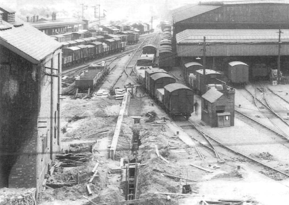 Close up showing some of the advanced groundwork being carried out to the left of the Outwards and Tranship shed