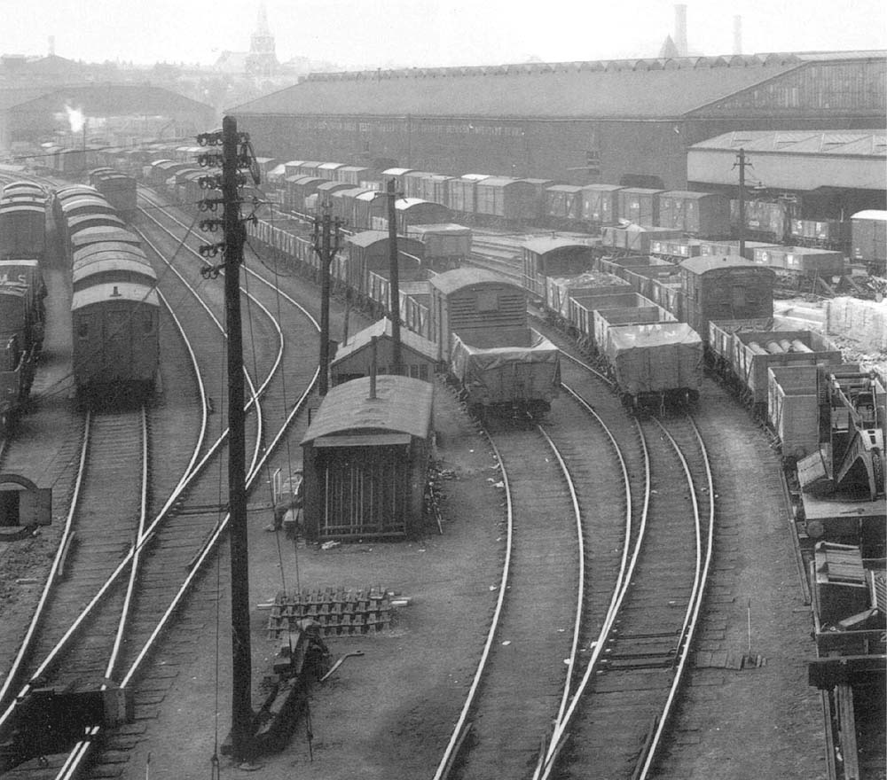 A general view of the sidings running adjacent to the Outward and Tranship shed on 17th August 1938