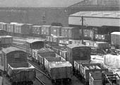 Close up showing the variety of open wagons and box vans in use by the GWR and the other railway companies