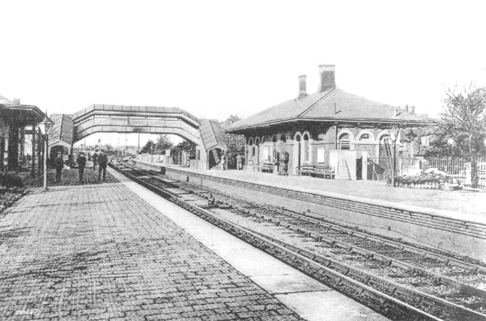 Edwardian view of Knowle and Dorridge station looking towards Birmingham with the down platform building on the left