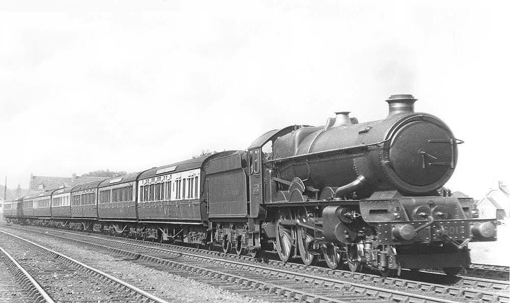 GWR 4-6-0 No 6013 'King Henry VIII' is seen approaching Knowle and Dorridge at the head of an express train in September 1929