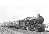 GWR 4-6-0 No 6013 'King Henry VIII' is seen approaching Knowle and Dorridge at the head of an express train in September 1929