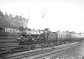 GWR 4-6-0 Castle class No 4016 'Night of the Golden Fleece' is seen at the head of a down express service during the quadrupling of the line
