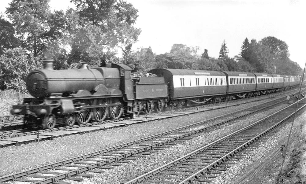 GWR 4-6-0 Saint class No 2983 'Redgauntlet' is seen at the head of a down express train as it approaches Knowle and Dorridge