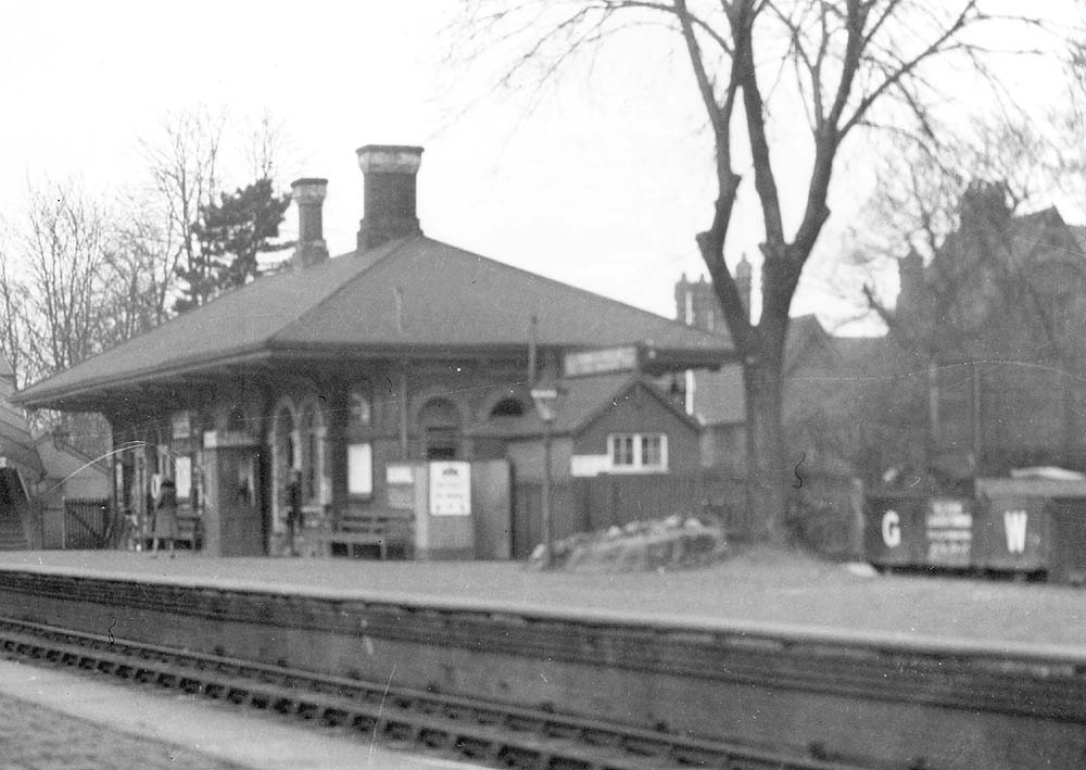 Close up showing the up platform building and the end of the goods yard with coal merchants office