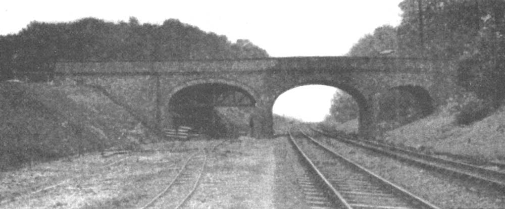 Three arch brick over bridge at Chessett�s Wood in the process of being modified by the replacement of one of the side arches