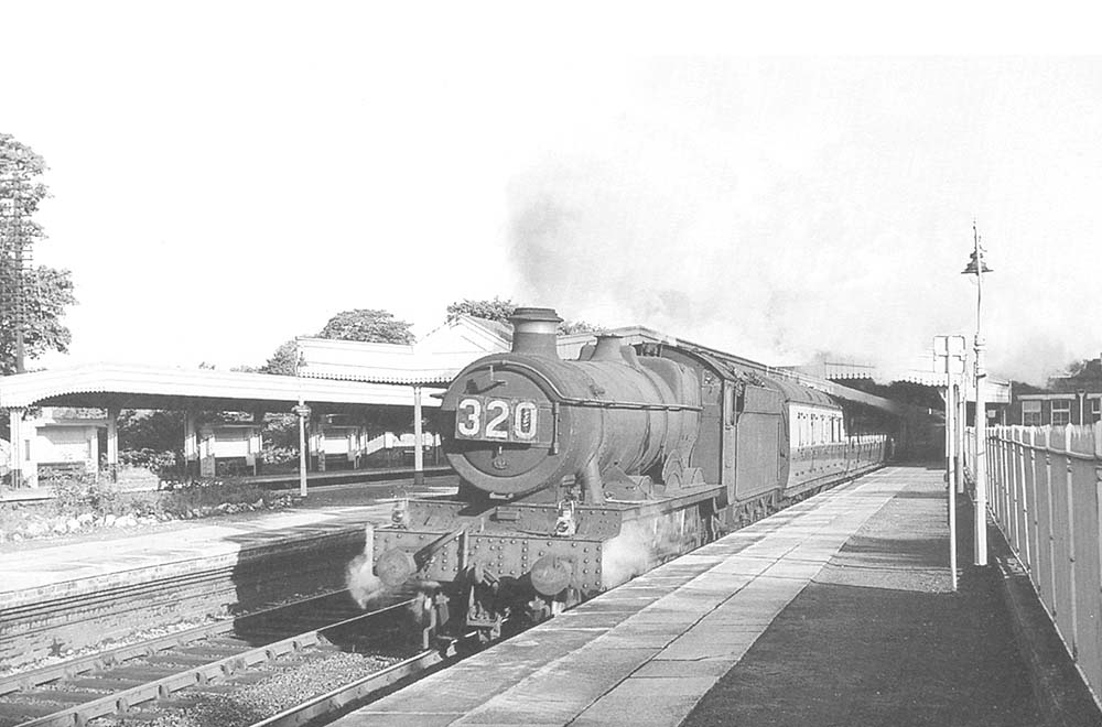 Ex-GWR 4-6-0 Hall class No 4944 'Middleton Hall' is seen on 6:55am Wolverhampton to Paignton service via Stratford upon Avon on 14th August 1959
