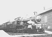 GWR 4-4-0 No 3823 'County of Carnarvon' is about to leave with the 10:20am up express from Snow Hill on 18th April 1912