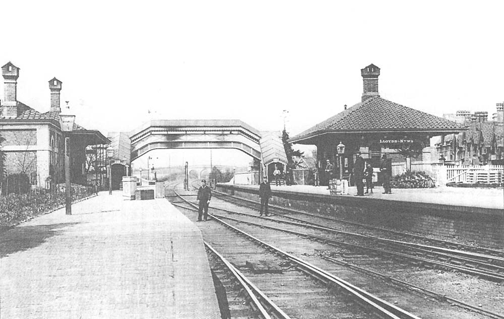 A late Victorian view of Knowle and Dorridge station showing staff standing between the platforms