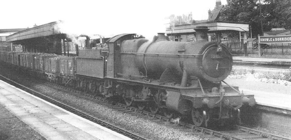 Ex-GWR 2-8-0 No 2833 is seen passing through the station's up relief line with a freight service circa 1951
