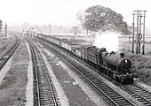GWR 2-8-0 28xx class No 3837 approaching Lapworth on the Up Main Line with a through freight of mostly mineral open wagons