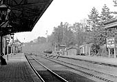 Close showing Lapworth Signal Box, the station's small goods yard opposite and the station's name board