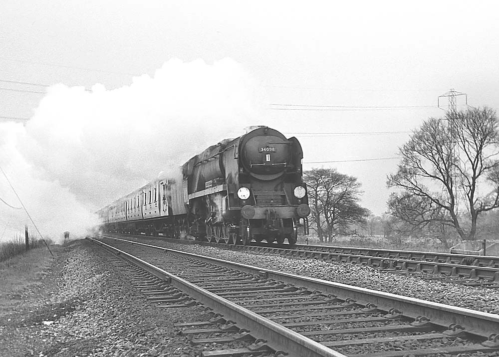 West Country Class 4-6-2 No 34098 'Templecombe' near Lapworth with a football special on 27th April 1963