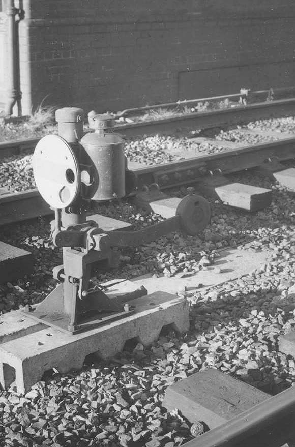 A shunting ground signal also known as a Tommy Dodd, is sited next to Lapworth Signal Box on 2nd December 1961