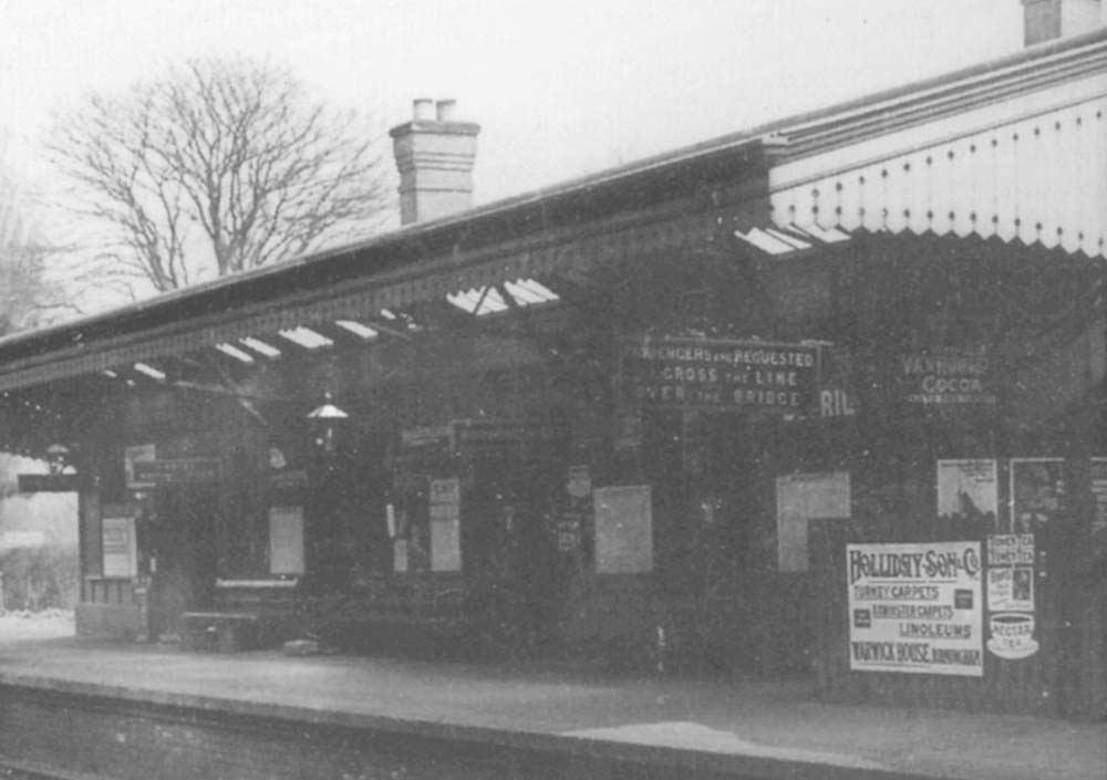 Close up which provides a better indication of the size of the station building and which shows signs for various passenger facilities