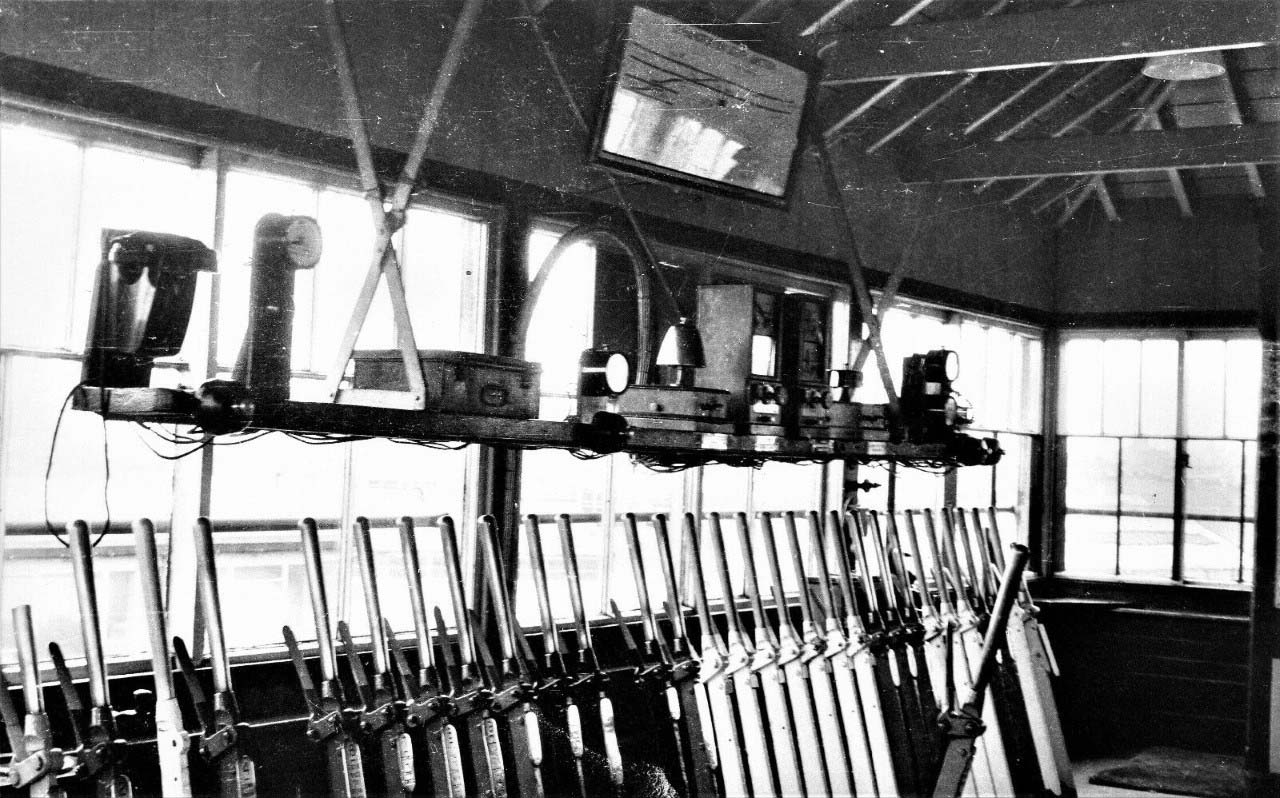 A post 1961 internal view of Leamington South Junction Signal Box showing a large number of white levers ((indicating spares) in the frame.