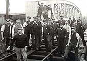 A group of GWR Permanent Way men are seen standing on the bridge after it has been completed