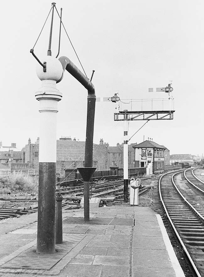 View of the water crane located at the London end of Leamington station's up platform in July 1966