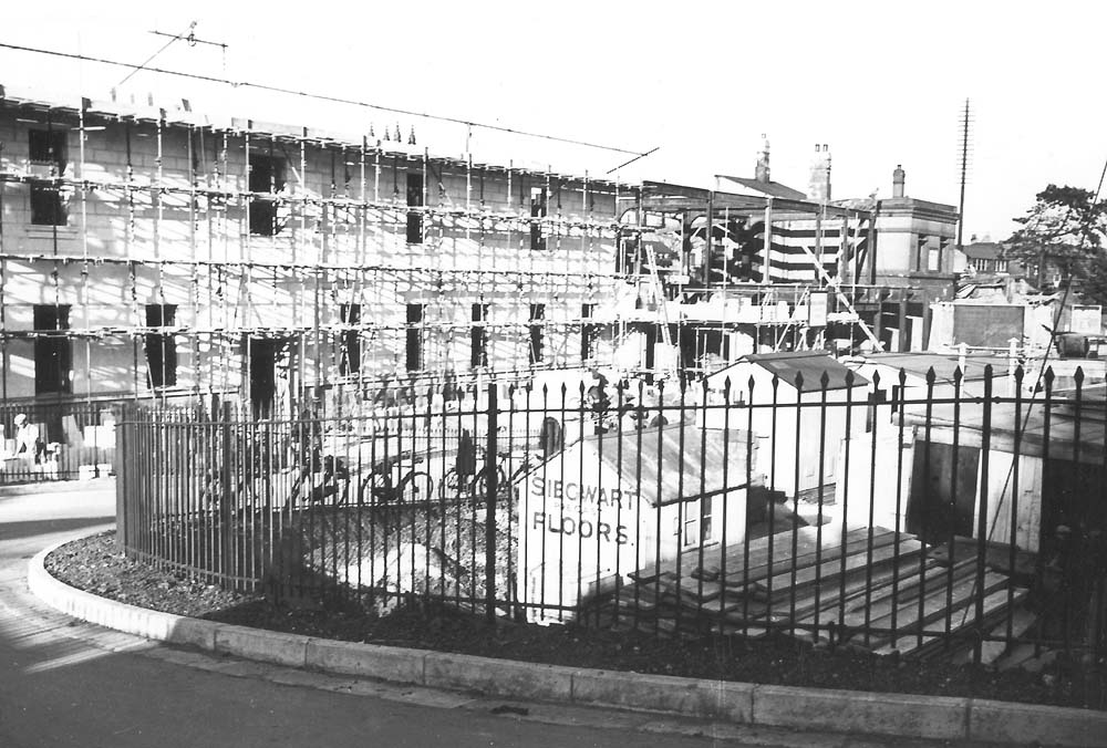 View of the new steel framed station building being erected as seen from the entrance nearest to Warwick