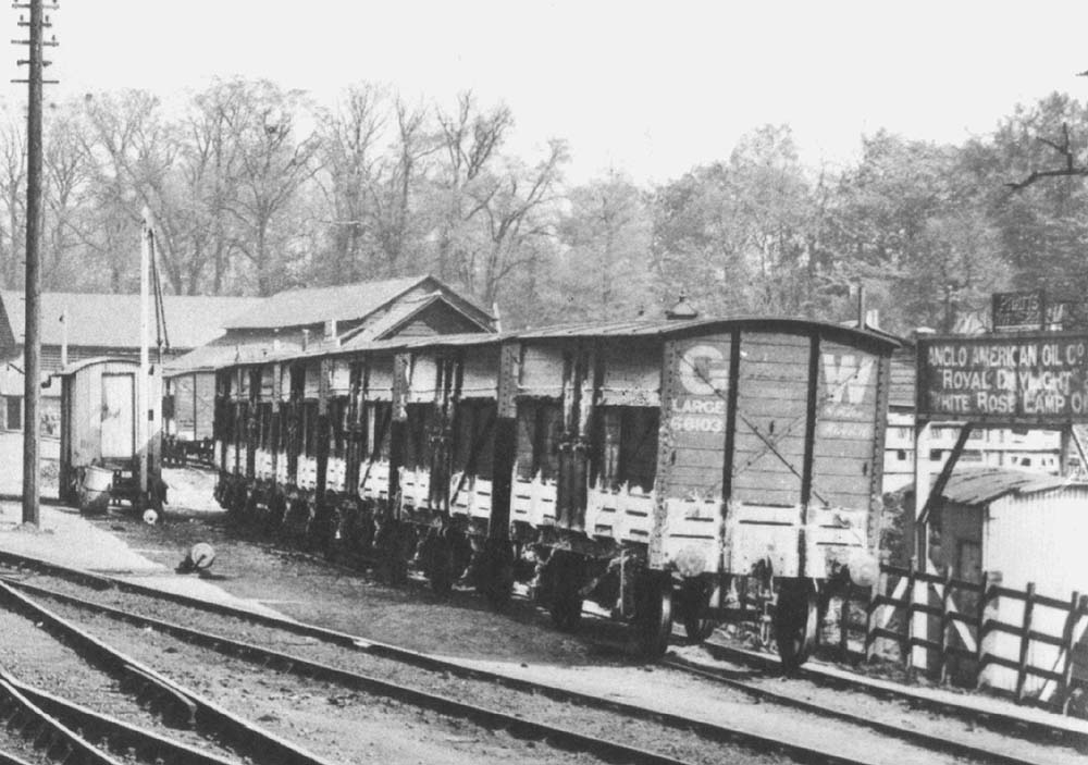 Close up showing Leamington Spa's goods yard and sidings and a rake of five cattle wagons