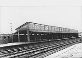 View of the up platform from the west end of the down platform with coaching stock seen standing in the up bay