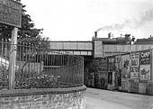A GWR 0-6-0 'Armstrong Goods' thought to No 495 crosses the bridge carrying the line over Lower Avenue