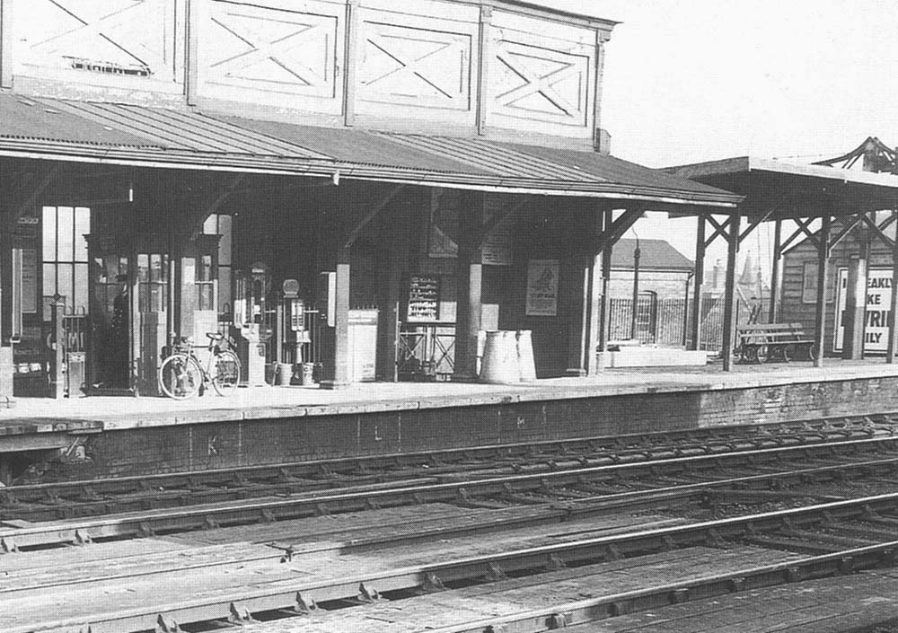 Close up showing the ticket inspector's booth next to the exit to the staircase leading down to the subway