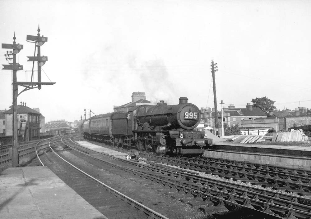 Ex-GWR 4-6-0 King class No 6008 'King James II' pulls into the down platform at the head of a down express